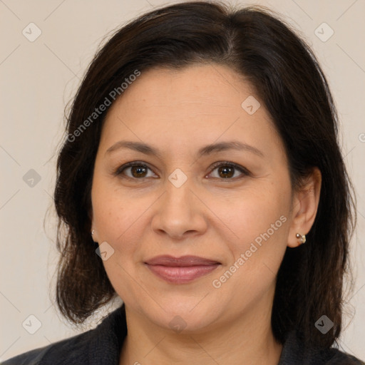 Joyful white adult female with medium  brown hair and brown eyes