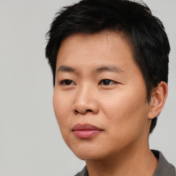 Neutral asian young-adult male with short  black hair and brown eyes