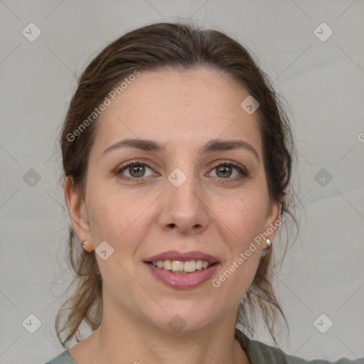 Joyful white adult female with medium  brown hair and grey eyes