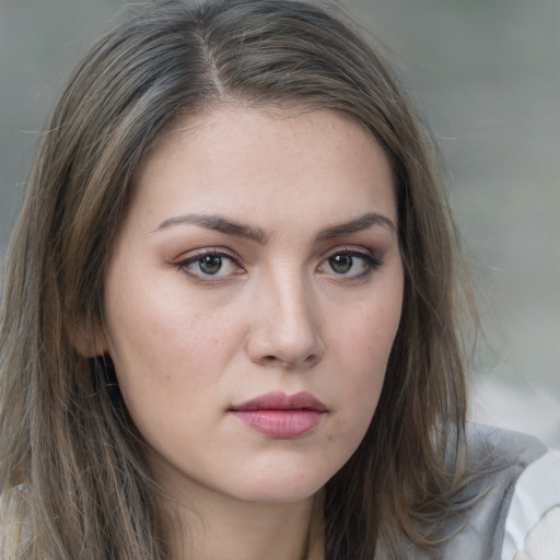 Neutral white young-adult female with long  brown hair and grey eyes