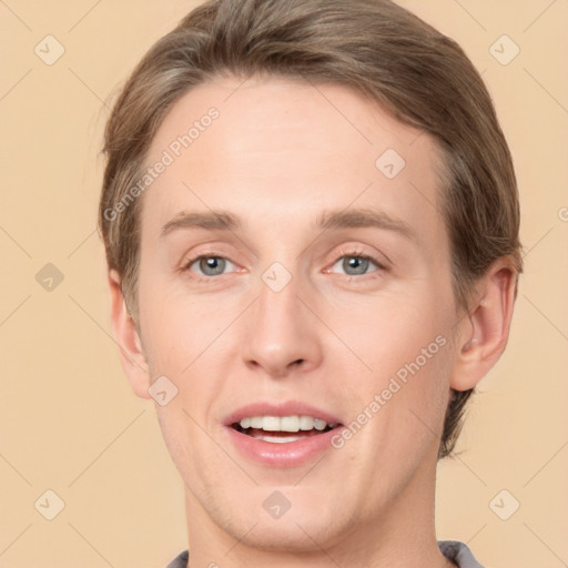 Joyful white adult male with short  brown hair and grey eyes