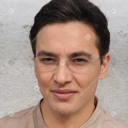 Joyful white adult male with short  brown hair and brown eyes