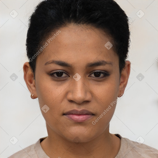 Joyful latino young-adult female with short  black hair and brown eyes