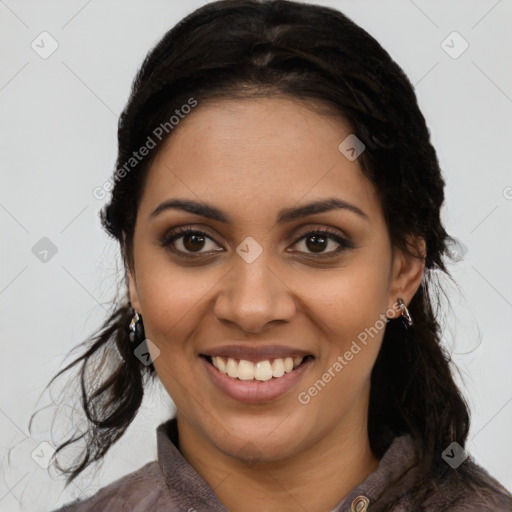 Joyful latino young-adult female with medium  brown hair and brown eyes