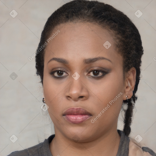 Neutral black young-adult female with medium  brown hair and brown eyes