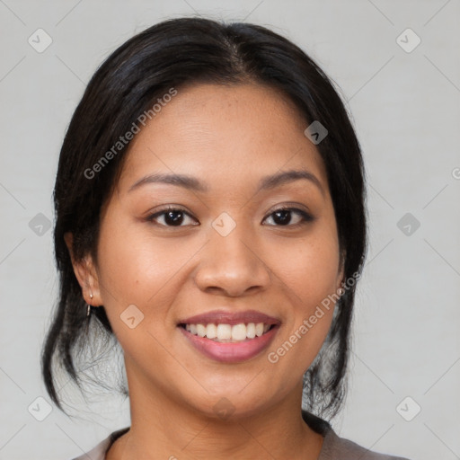 Joyful asian young-adult female with medium  brown hair and brown eyes