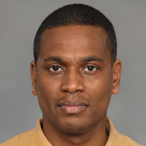 Neutral latino young-adult male with short  brown hair and brown eyes