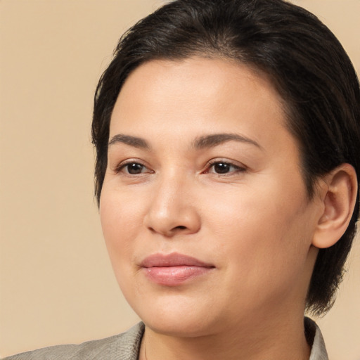 Joyful white young-adult female with medium  brown hair and brown eyes