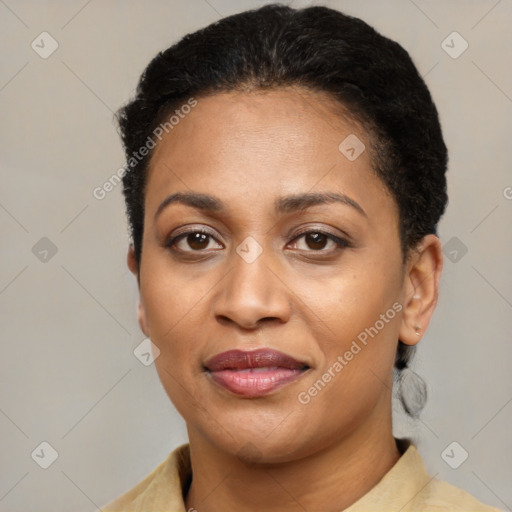 Joyful latino adult female with short  black hair and brown eyes