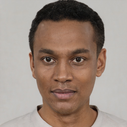 Neutral black young-adult male with short  black hair and brown eyes