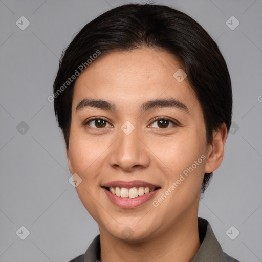 Joyful white young-adult female with short  brown hair and brown eyes