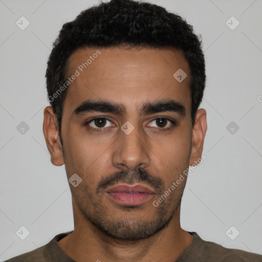 Neutral latino young-adult male with short  black hair and brown eyes