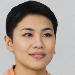Joyful asian young-adult female with short  black hair and brown eyes