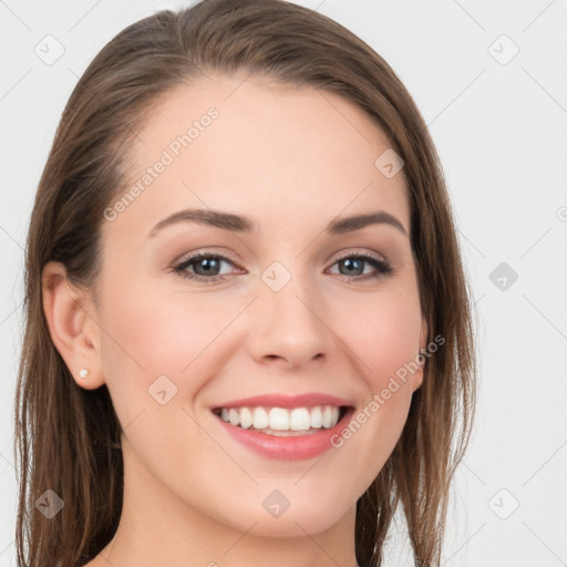 Joyful white young-adult female with long  brown hair and grey eyes