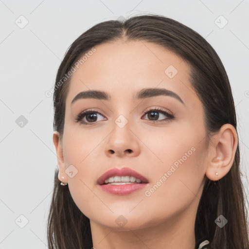 Neutral white young-adult female with long  brown hair and brown eyes