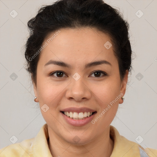 Joyful latino young-adult female with short  brown hair and brown eyes