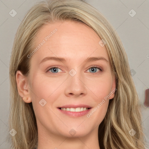 Joyful white young-adult female with long  brown hair and blue eyes