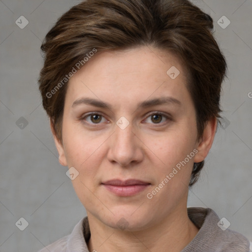 Joyful white adult female with short  brown hair and brown eyes