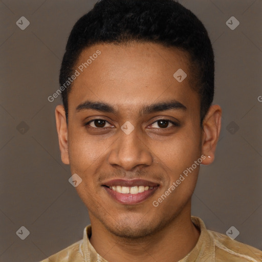 Joyful black young-adult male with short  black hair and brown eyes