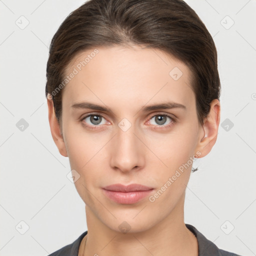 Neutral white young-adult female with short  brown hair and brown eyes