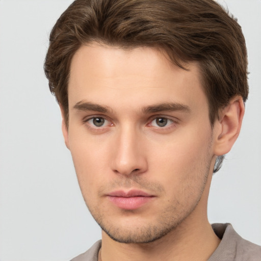 Neutral white young-adult male with short  brown hair and brown eyes