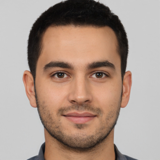 Neutral latino young-adult male with short  brown hair and brown eyes