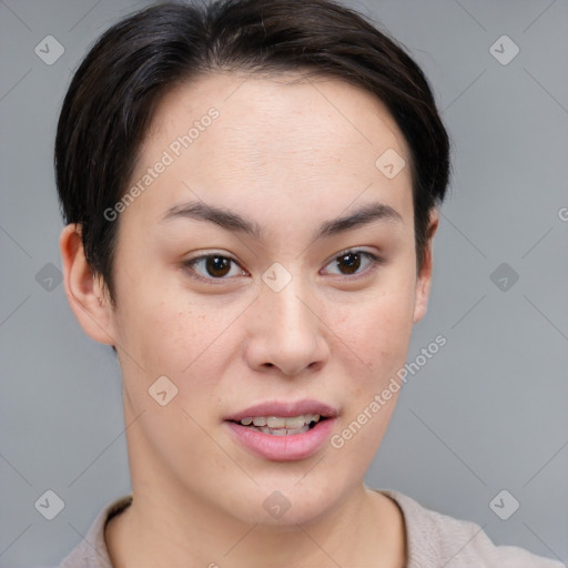 Joyful asian young-adult female with short  brown hair and brown eyes