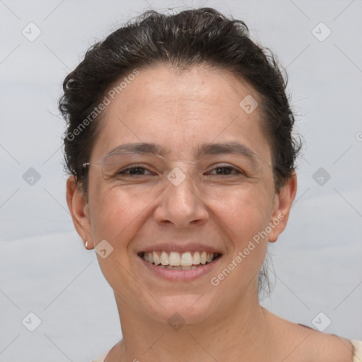 Joyful white adult female with short  brown hair and brown eyes