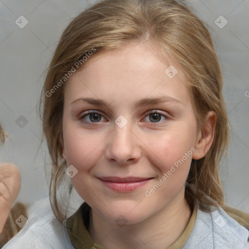 Joyful white child female with medium  brown hair and brown eyes