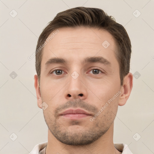 Neutral white young-adult male with short  brown hair and brown eyes