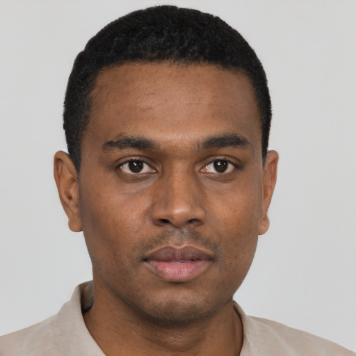 Neutral black young-adult male with short  black hair and brown eyes