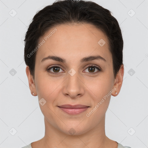 Joyful white young-adult female with short  brown hair and brown eyes