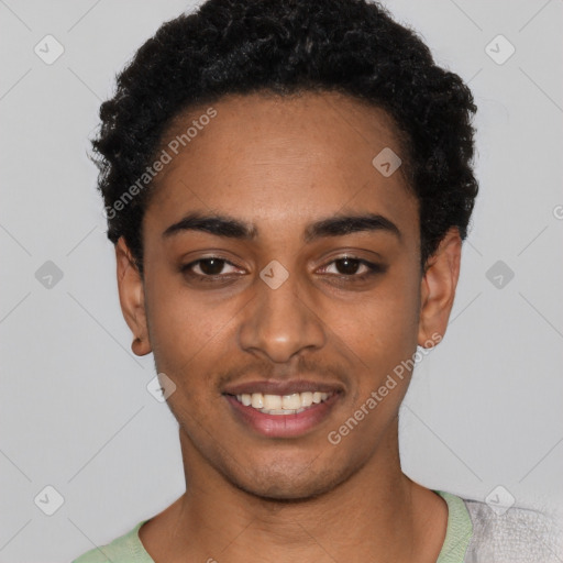 Joyful black young-adult male with short  black hair and brown eyes