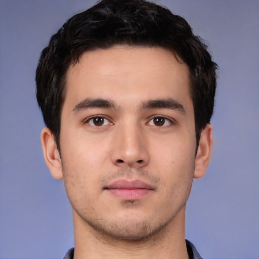 Neutral white young-adult male with short  black hair and brown eyes