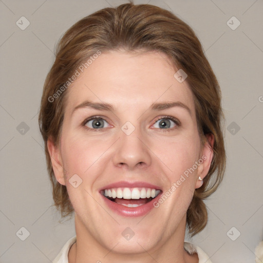 Joyful white young-adult female with medium  brown hair and blue eyes