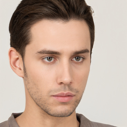 Neutral white young-adult male with short  brown hair and brown eyes