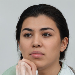 Neutral white young-adult female with medium  brown hair and brown eyes