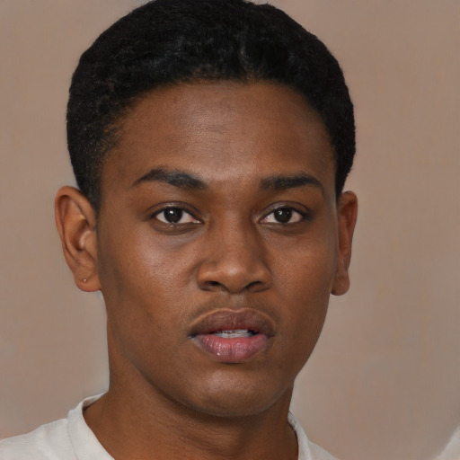 Neutral black young-adult male with short  black hair and brown eyes