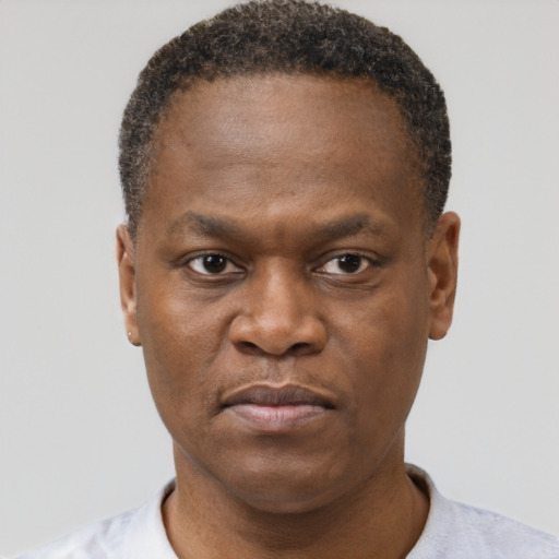 Neutral black adult male with short  brown hair and brown eyes