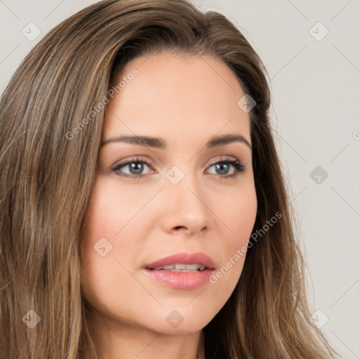 Neutral white young-adult female with long  brown hair and brown eyes