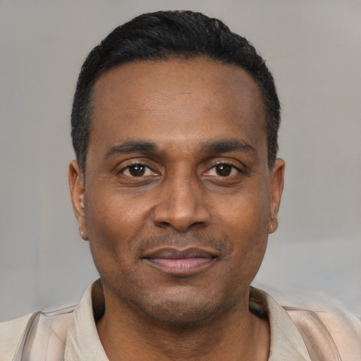 Neutral black young-adult male with short  black hair and brown eyes