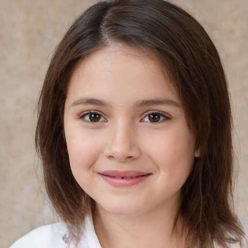 Joyful white child female with medium  brown hair and brown eyes