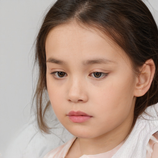 Neutral white child female with medium  brown hair and brown eyes