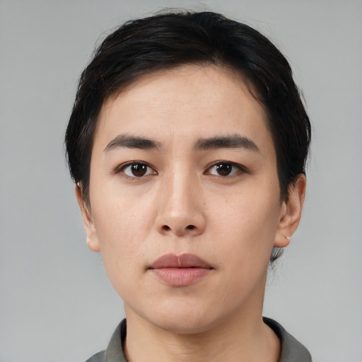 Neutral white young-adult female with short  black hair and brown eyes
