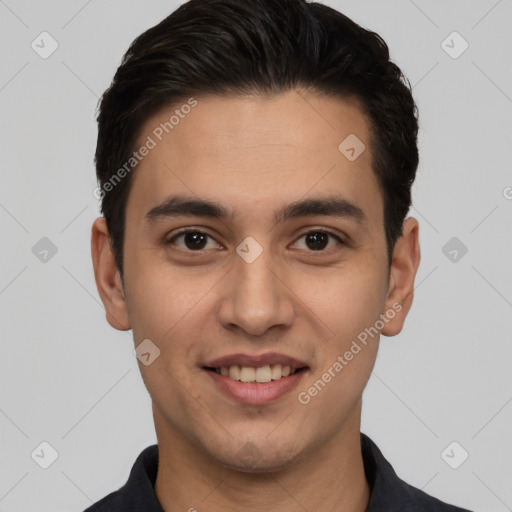 Joyful white young-adult male with short  black hair and brown eyes