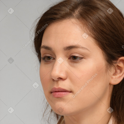 Neutral white young-adult female with medium  brown hair and brown eyes