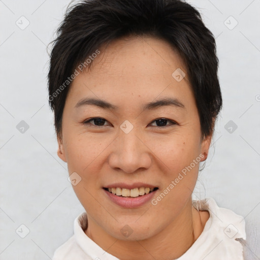 Joyful asian young-adult female with short  brown hair and brown eyes