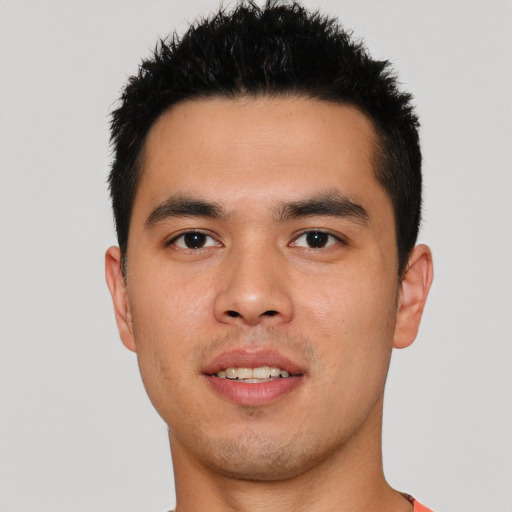 Joyful asian young-adult male with short  black hair and brown eyes