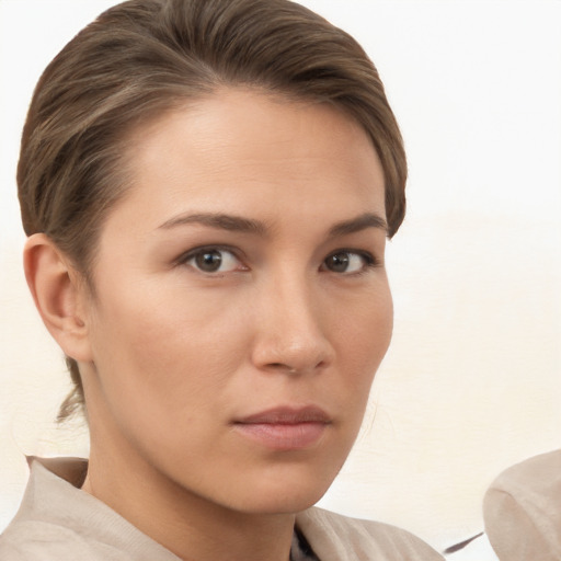 Neutral white young-adult female with short  brown hair and brown eyes