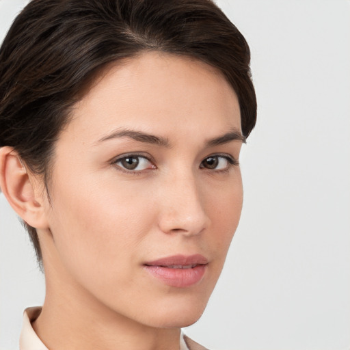 Neutral white young-adult female with short  brown hair and brown eyes